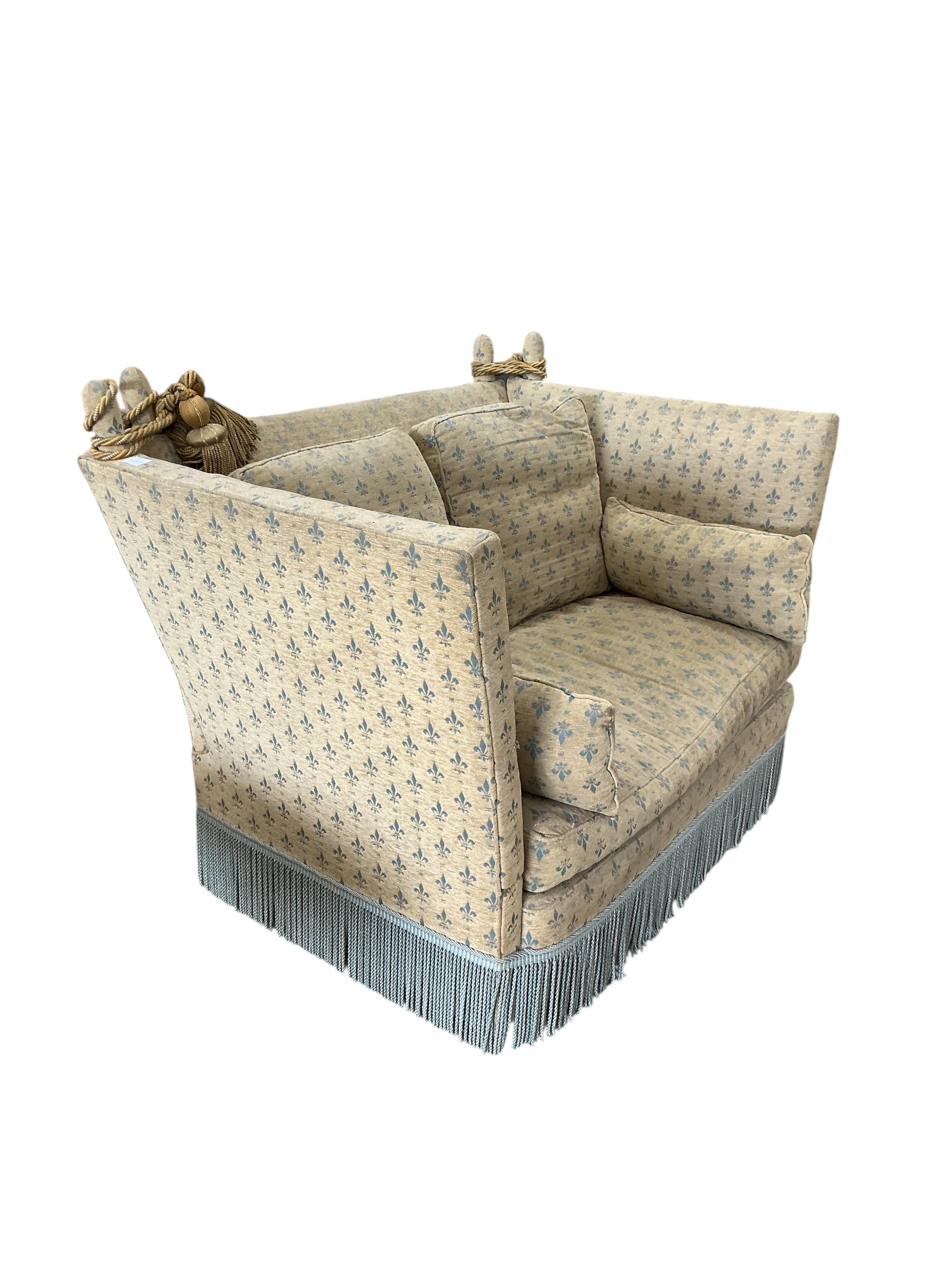 A small Knole upholstered settee, width 144cm, depth 90cm, height 100cm